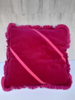 Coussin dos à volant fuschia