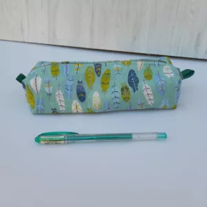 Trousse avec plumes